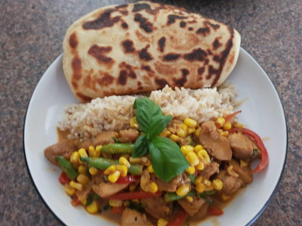 Asian Basil Chicken Curry with basil rice and naan bread scaled